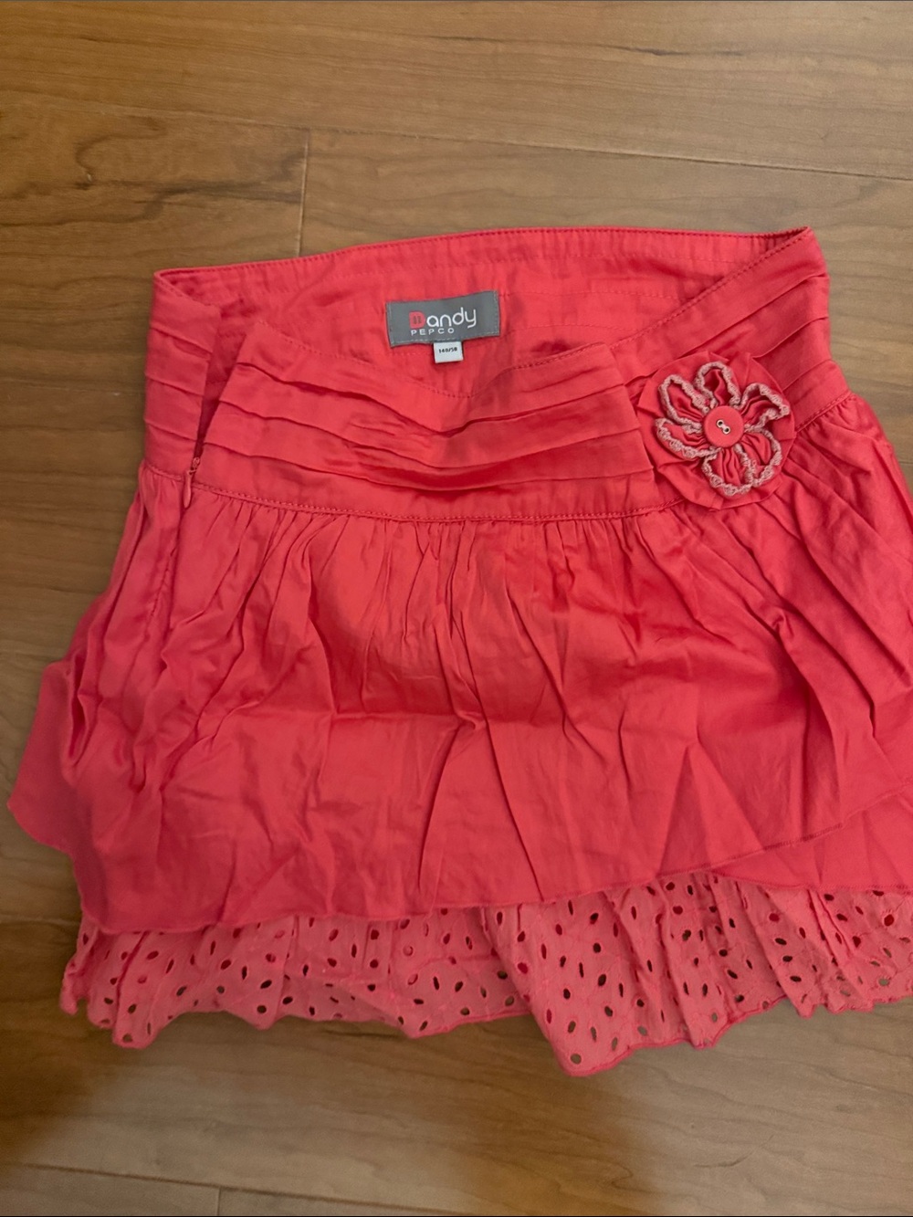 Girls Coral Tiered Skirt with Flower Accent